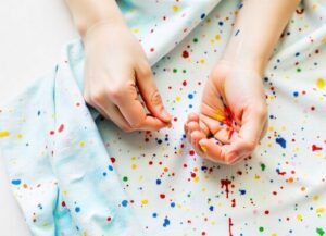 how to get food coloring out of clothes